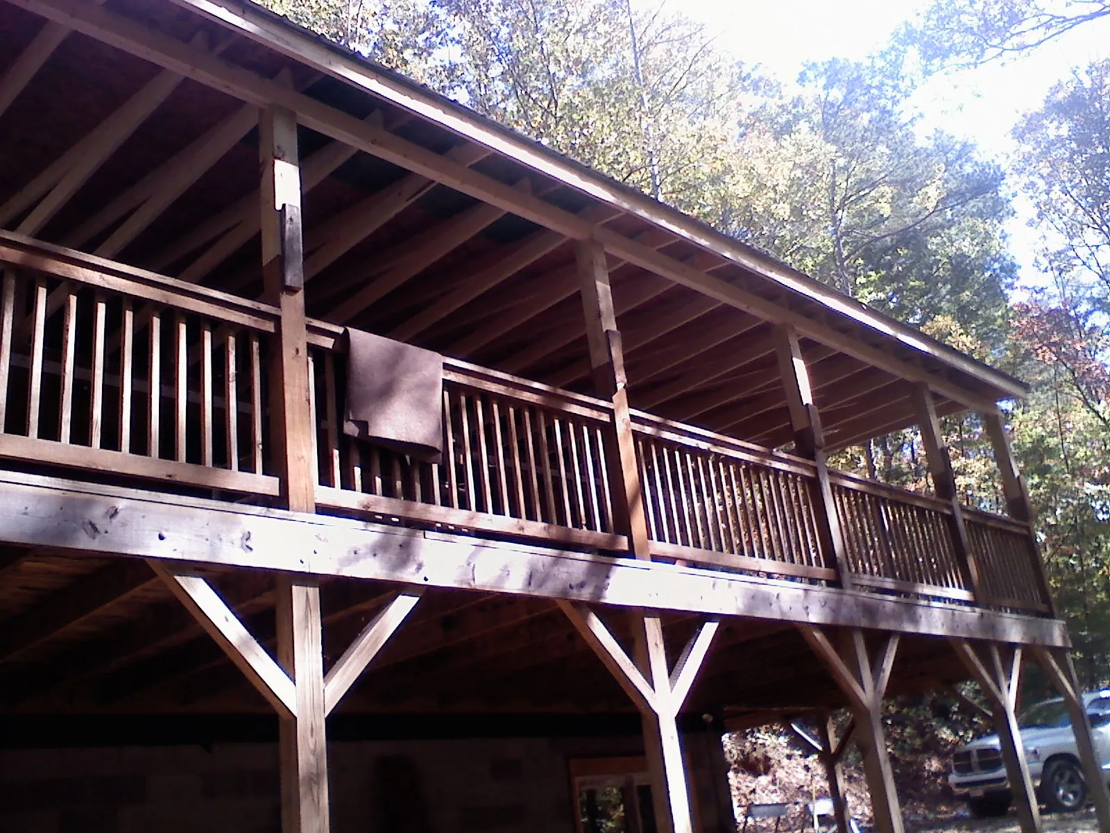 Timber framing under a new elevated porch and deck — Roof Leak Repair in Jamaica Plain by Roofing Brothers